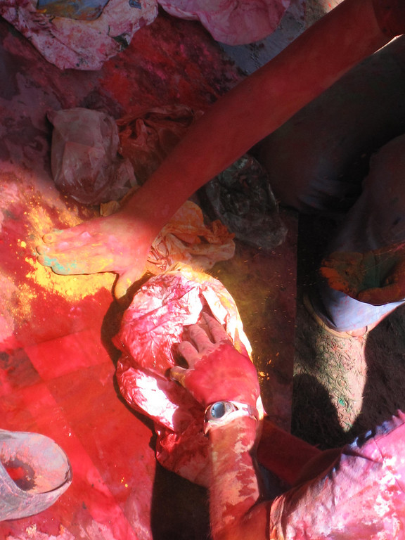 holi powder stains the ground as we throw colors