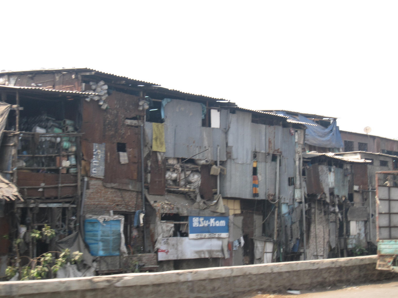 The mumbai slums near the airport. Blurry scenes of the mumbai slums near the airport.