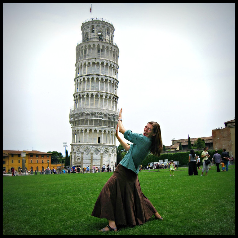 Goofing off at the Leaning Tower of Pisa in Italy. Fun at the Leaning tower of Pisa