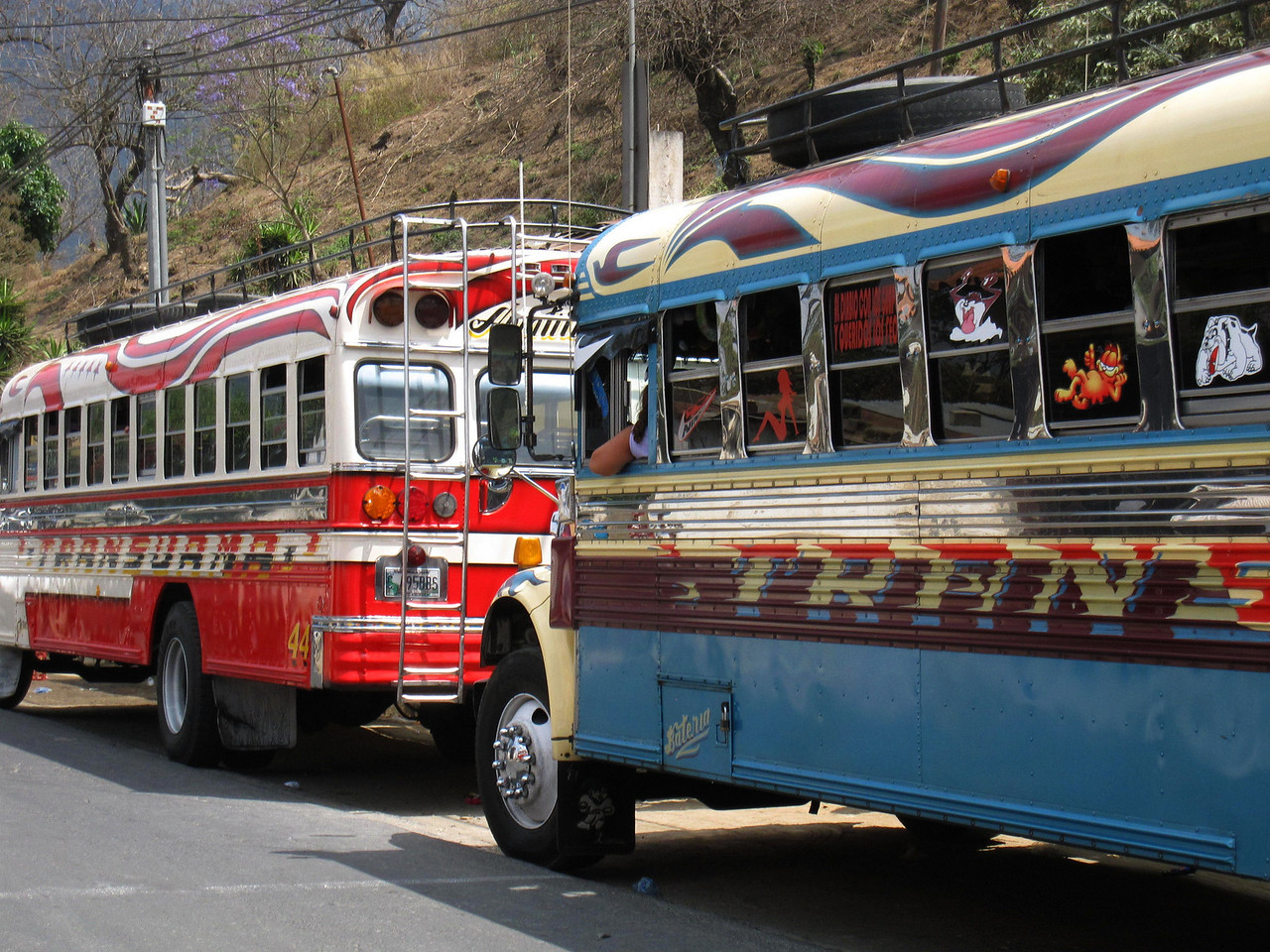 decorated chicken bus on the road in guatemala