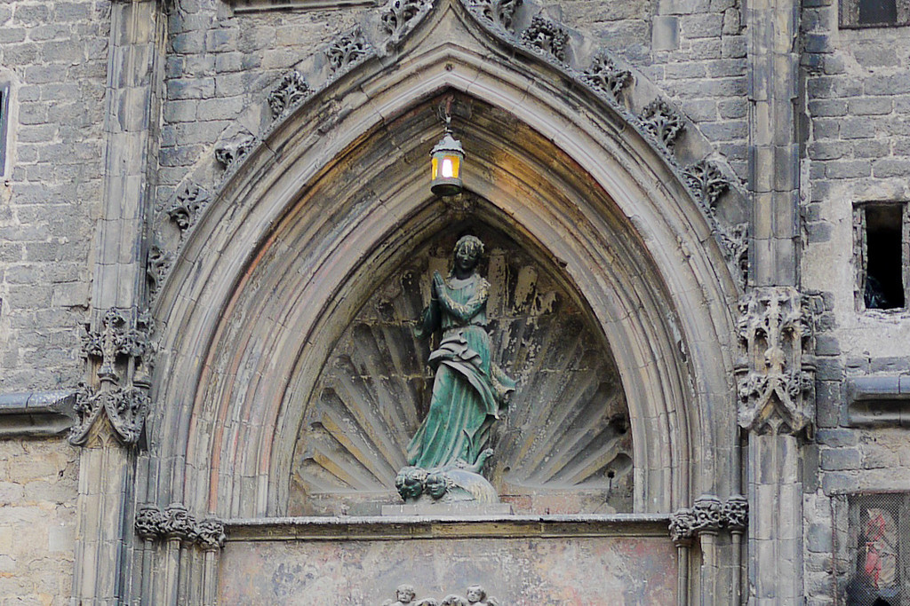 Delicate statues and carvings on the churches of Barcelona, Spain.