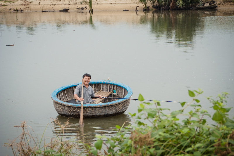 Big smiles from a local as I bike around the area! Smiles from an local Vietnamese man in a boat