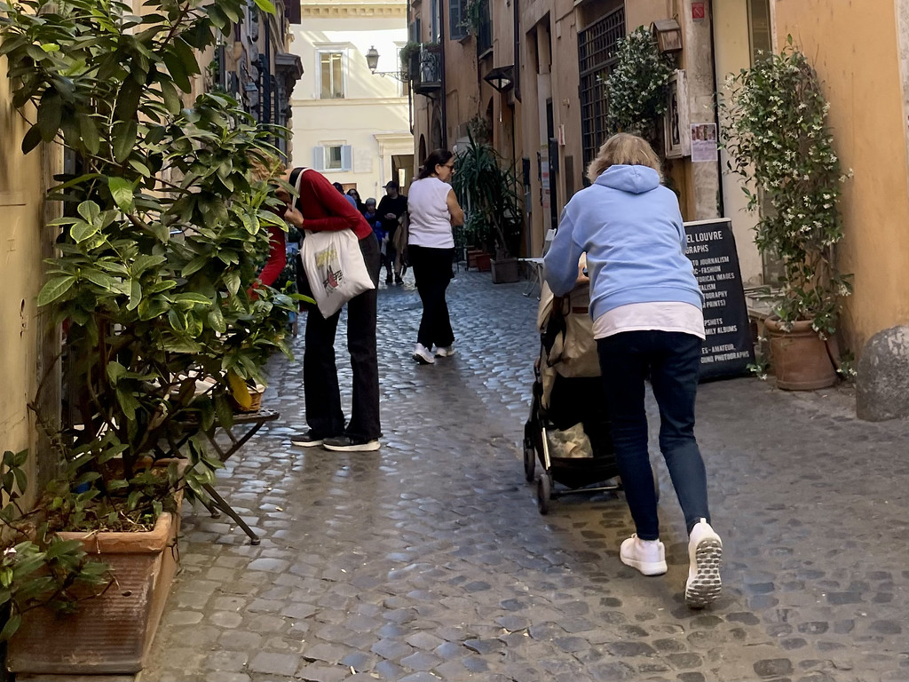 Cobbled streets with a stroller in Rome.