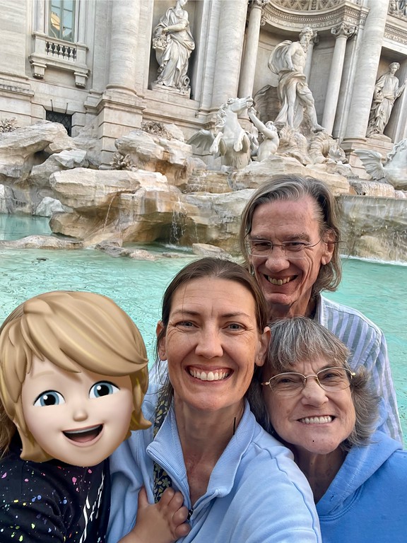 Trevi fountain with my toddler and parents. 