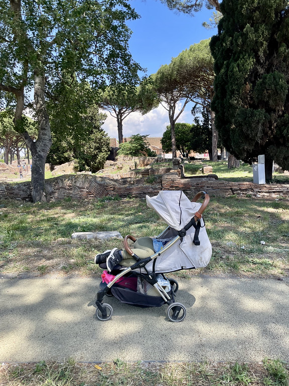 my son sleeping in his stroller at Ostia Antica
