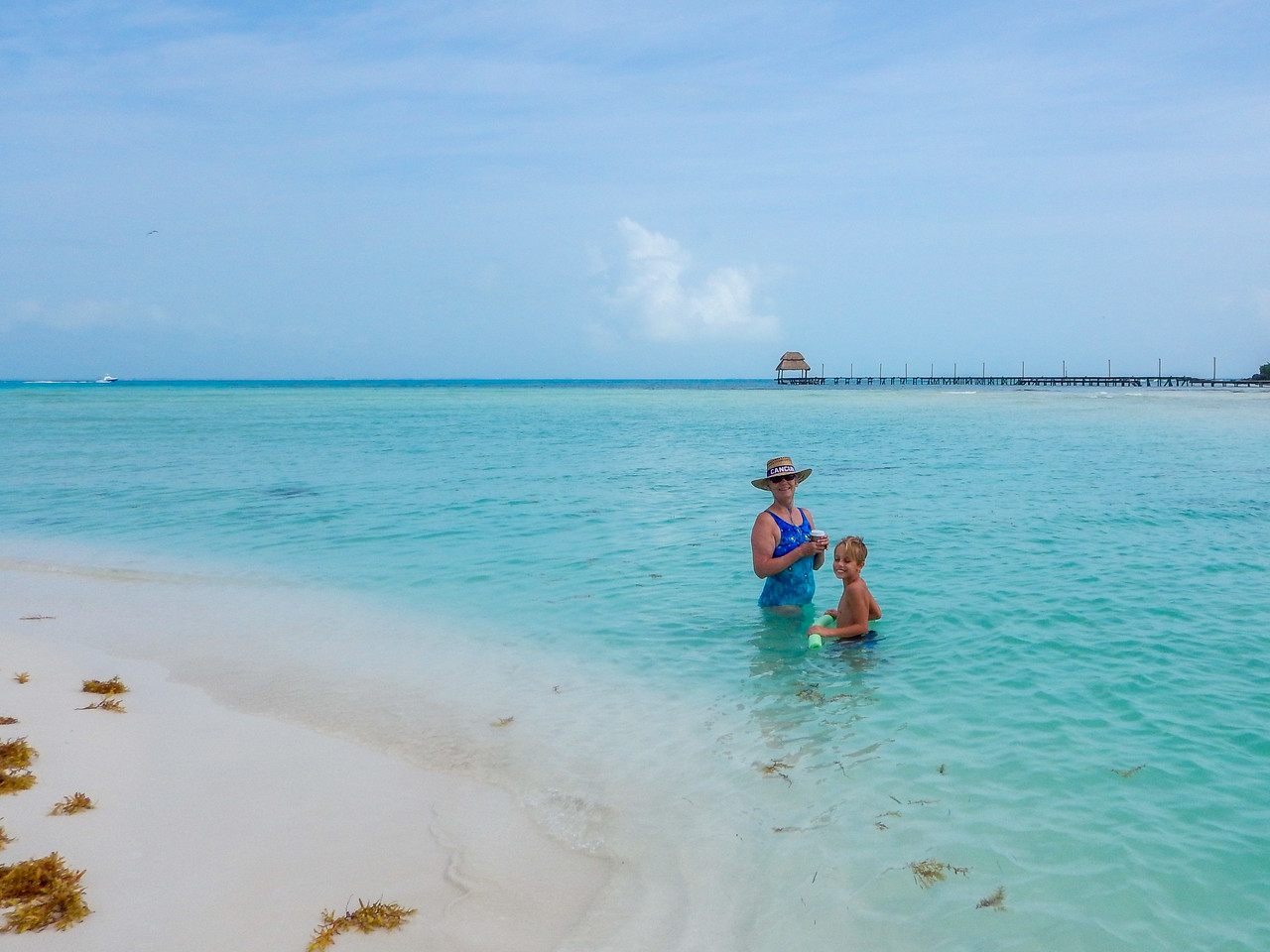 The icy blue waters of Playa Norte, Isla Mujeres on our yucatan family road tirp