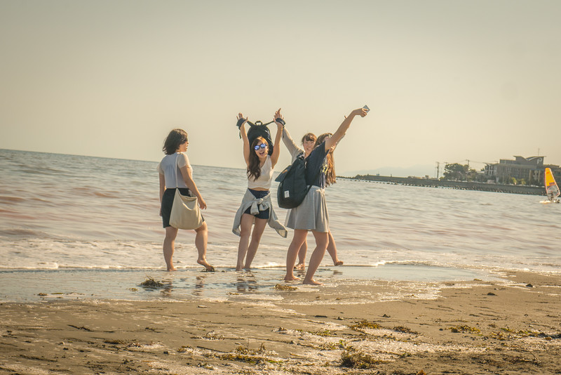 Young friends pose for a group selfie in Kamakura, Japan. girls posing selfie in Kamakura