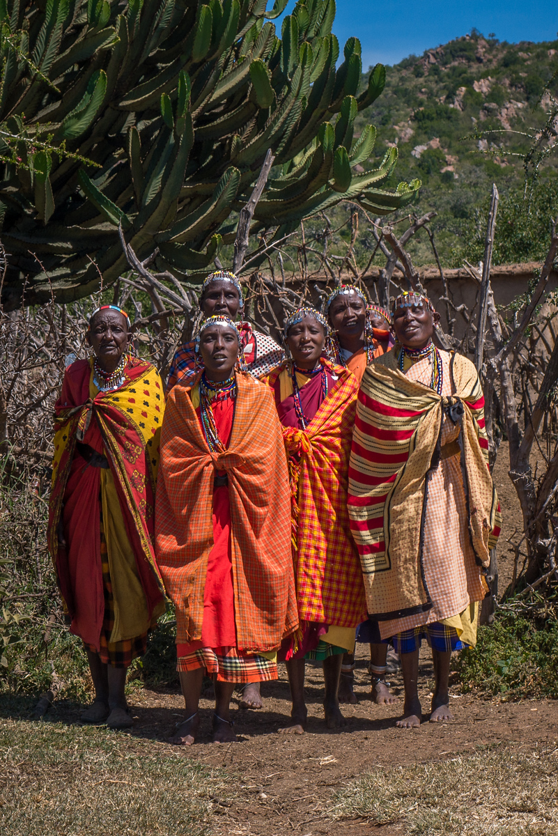 Women singing their hellos at the Widow's Village Women singing their hellos at the Widow's Village
