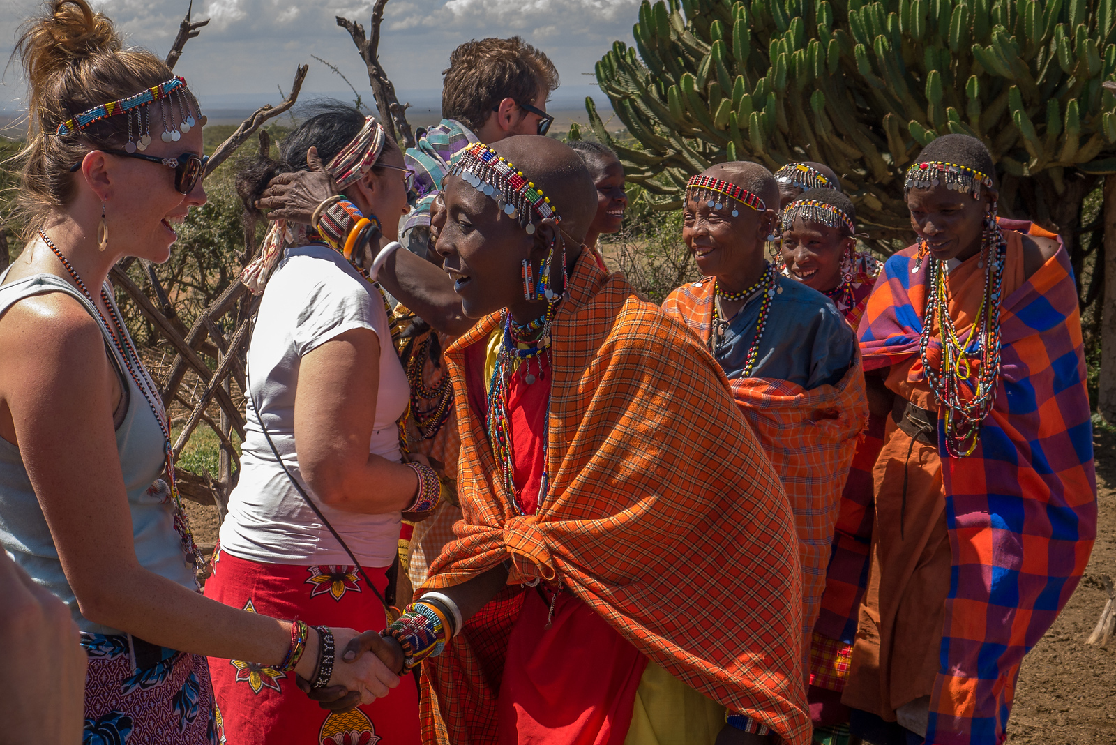After they danced and sang to welcome to their community, the women then shook our hands and showed us around their manyattas and explained their way of life. what it's like to meet Maasai women