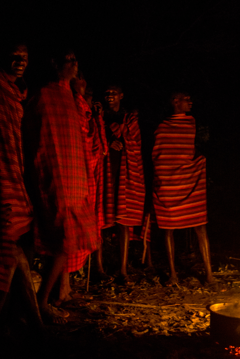 Experiencing an evening of Maasai song over a campfire Experiencing an evening of Maasai song over a campfire