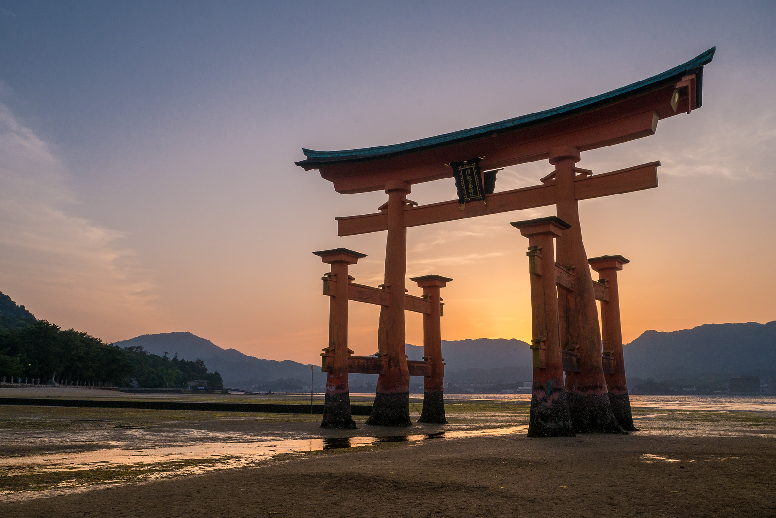 Sunet over Itsukushima Shrine on Miyajima Island Sunet over Itsukushima Shrine on Miyajima Island