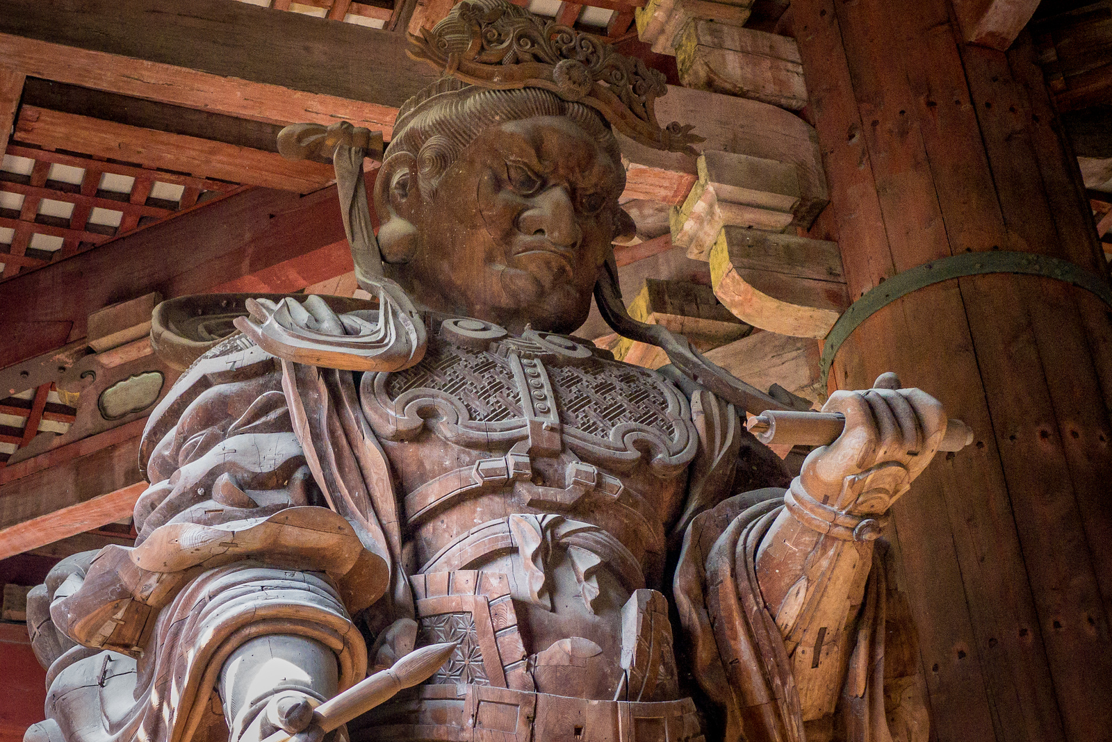 This is Komokuten, one of a pair of fierce, giant guardians of the Great Buddha in Todai-ji temple in Nara, Japan. The massive guardians were an unexpected addition to the temple; they are there to guard the Daibutsu, which is the largest bronze Buddha in the world. They make an impressive addition to an already stunning temple. Todai-ji is one of the world's largest wooden buildings; parts of it date back to 728. This is perhaps my favorite of the dozens of temples I've visited here in Japan. Nara as a whole, with its bowing deer and wooded forests was just lovely. Komokuten Todai-ji temple in Nara, Japan