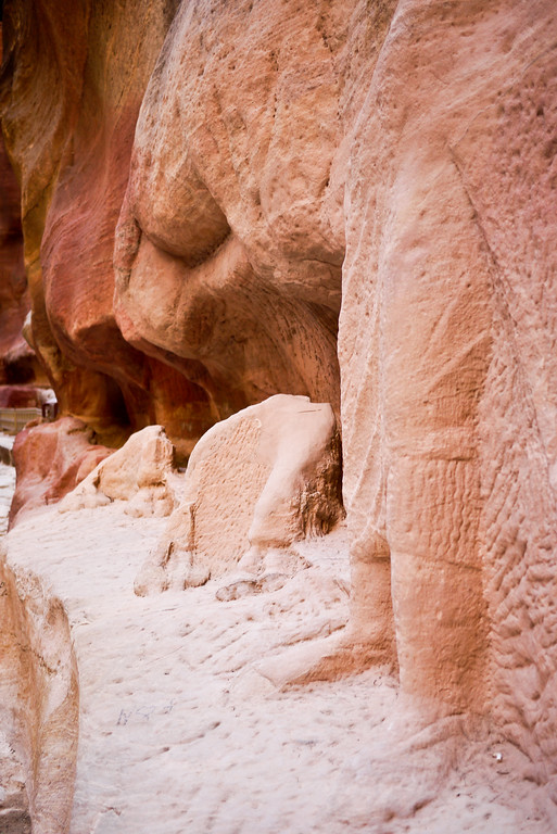A gorgeously detailed carving remains of a Bedouin and his camel inside of Petra, Jordan. detailed carving remains of a Bedouin and his camel inside of Petra, Jordan.