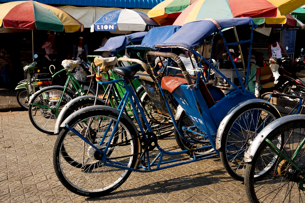 Bicycle rickshaw Cambodia travel Phnom Penh. 