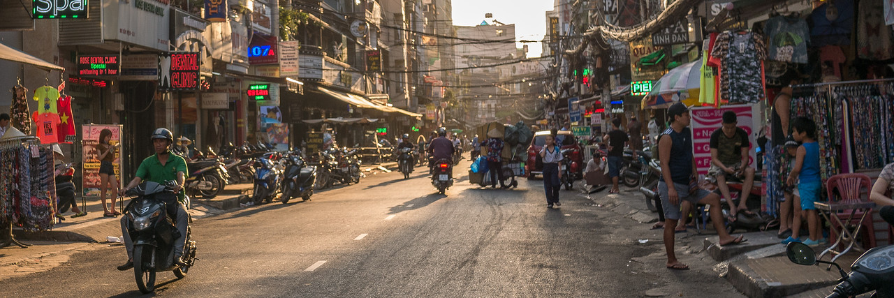 Motorcycles rush through the streets of Ho Chi Minh City Vietnam