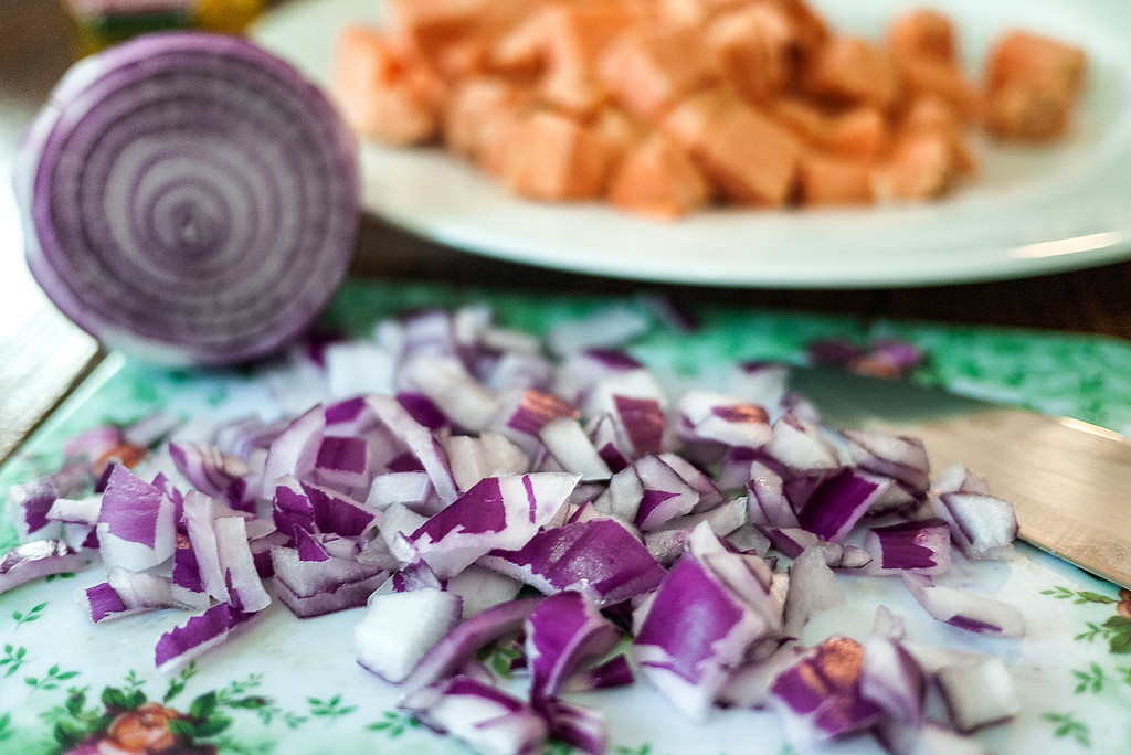Diced onions and cubed sweet potatoes.