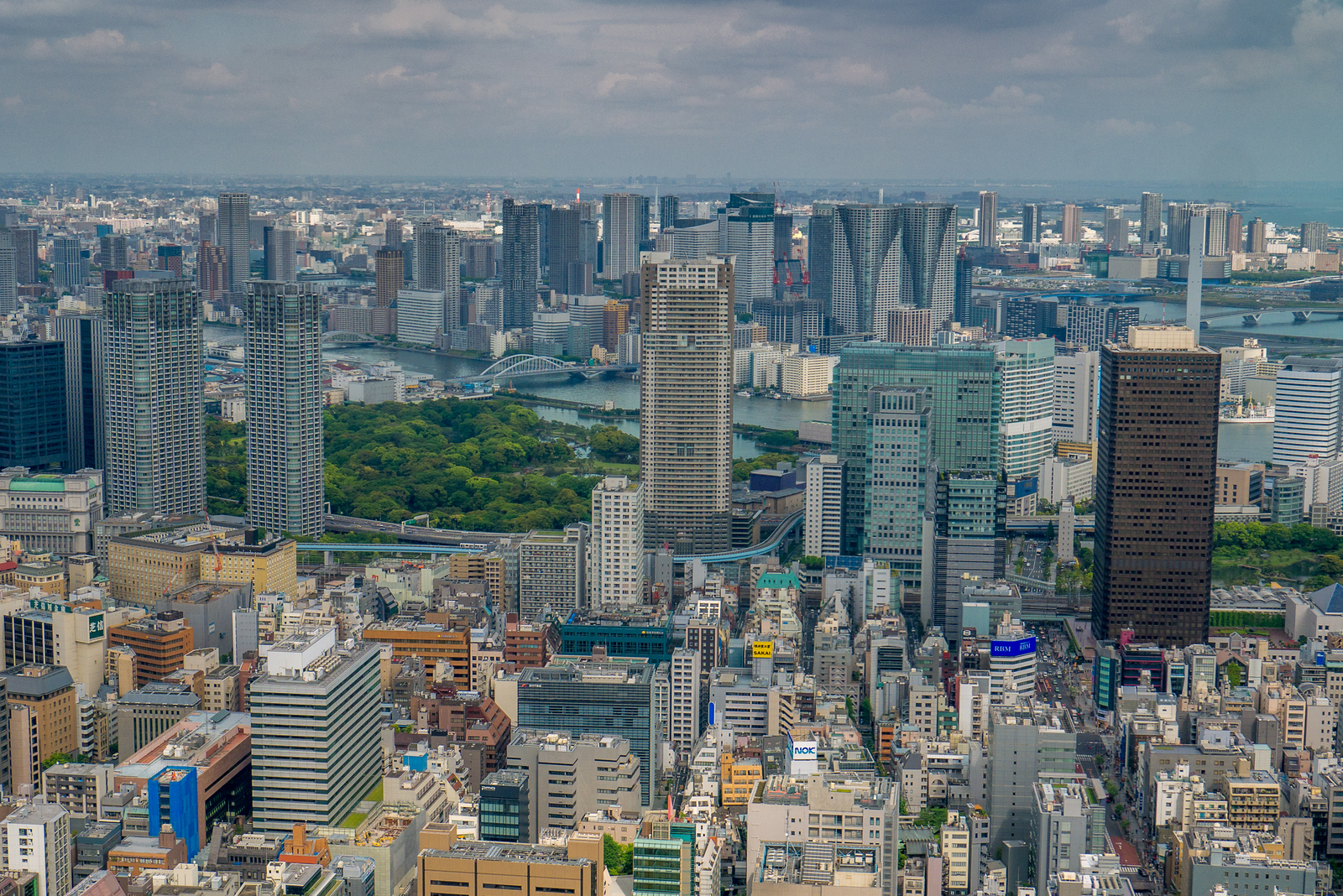 The impressive buildings of downtown Tokyo and sweeping views of the skyline from Tokyo Tower. tokyo cityscape from tokyo tower