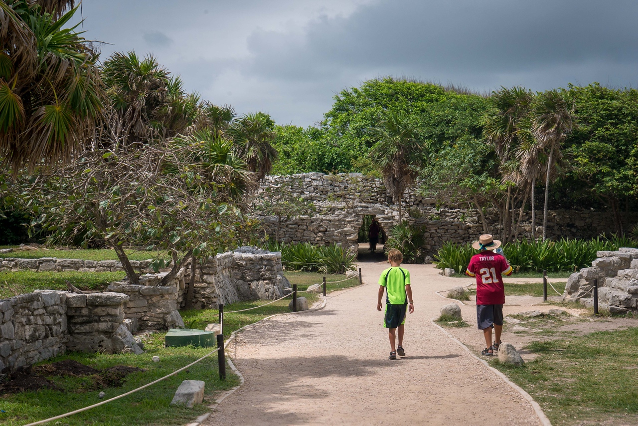 The boys exploring the ruins at Tulum. the boys exploring the ruins