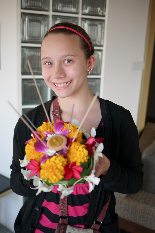 My niece shows off her krathong with fixings from the chiang mai market