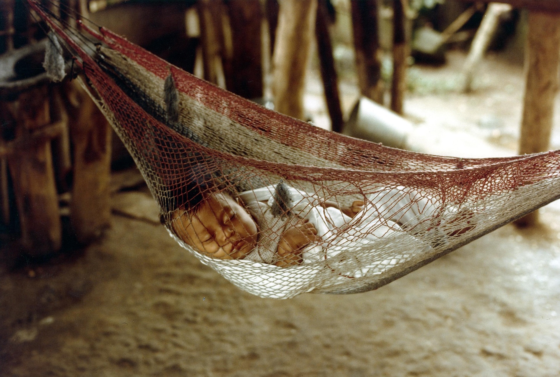 laid back culture in honduras means babies also sleep in hammocks
