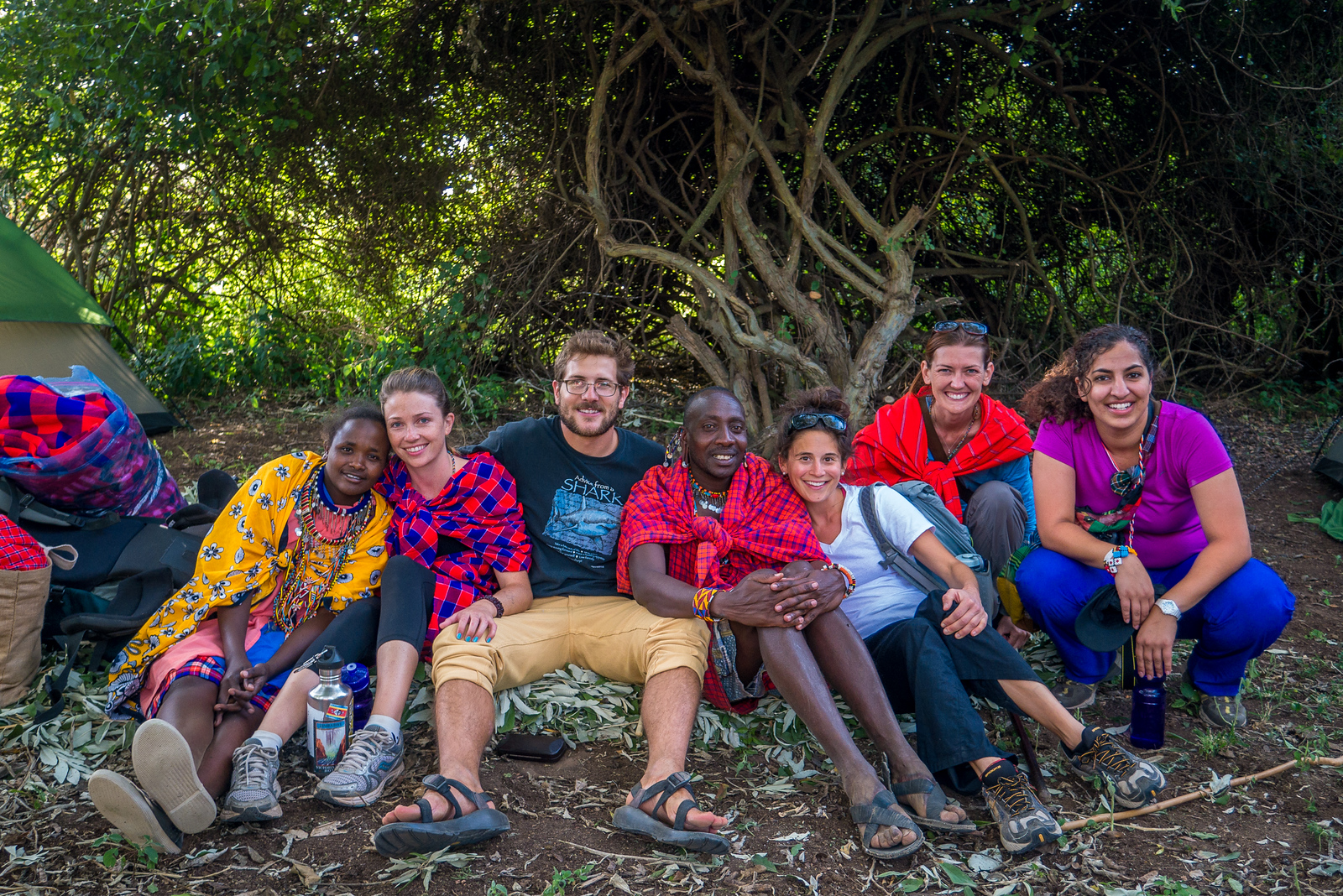 Our group visiting the Maji Moto Camp, I was the only non-doctor or nurse in the group. We are all resting after the walk, and that's the bed of sage leaves under us! Our group visiting the Maji Moto Camp, I was the only non-doctor or nurse in the group.