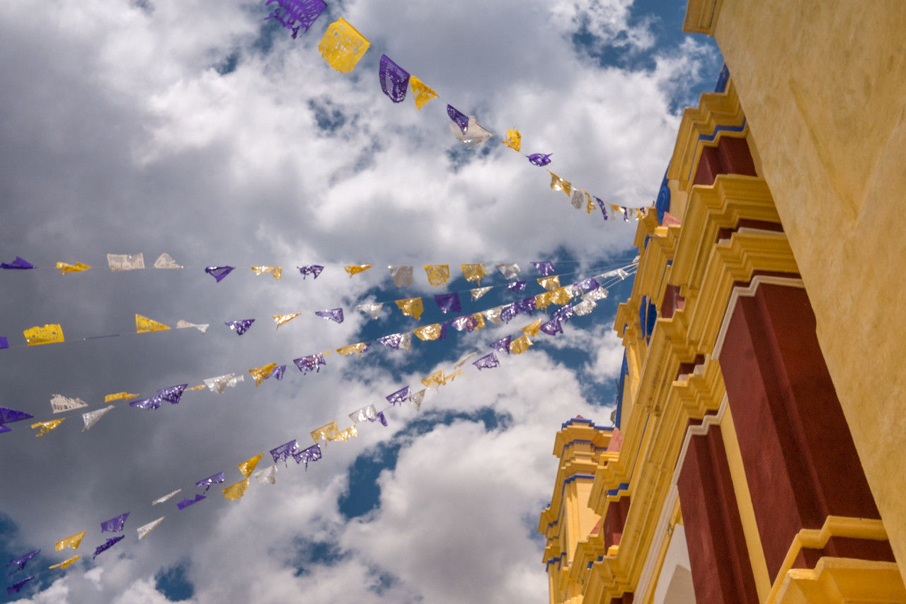 Semana Santa flags on the church at the Feria del tejate in Huayapam, Oaxaca.