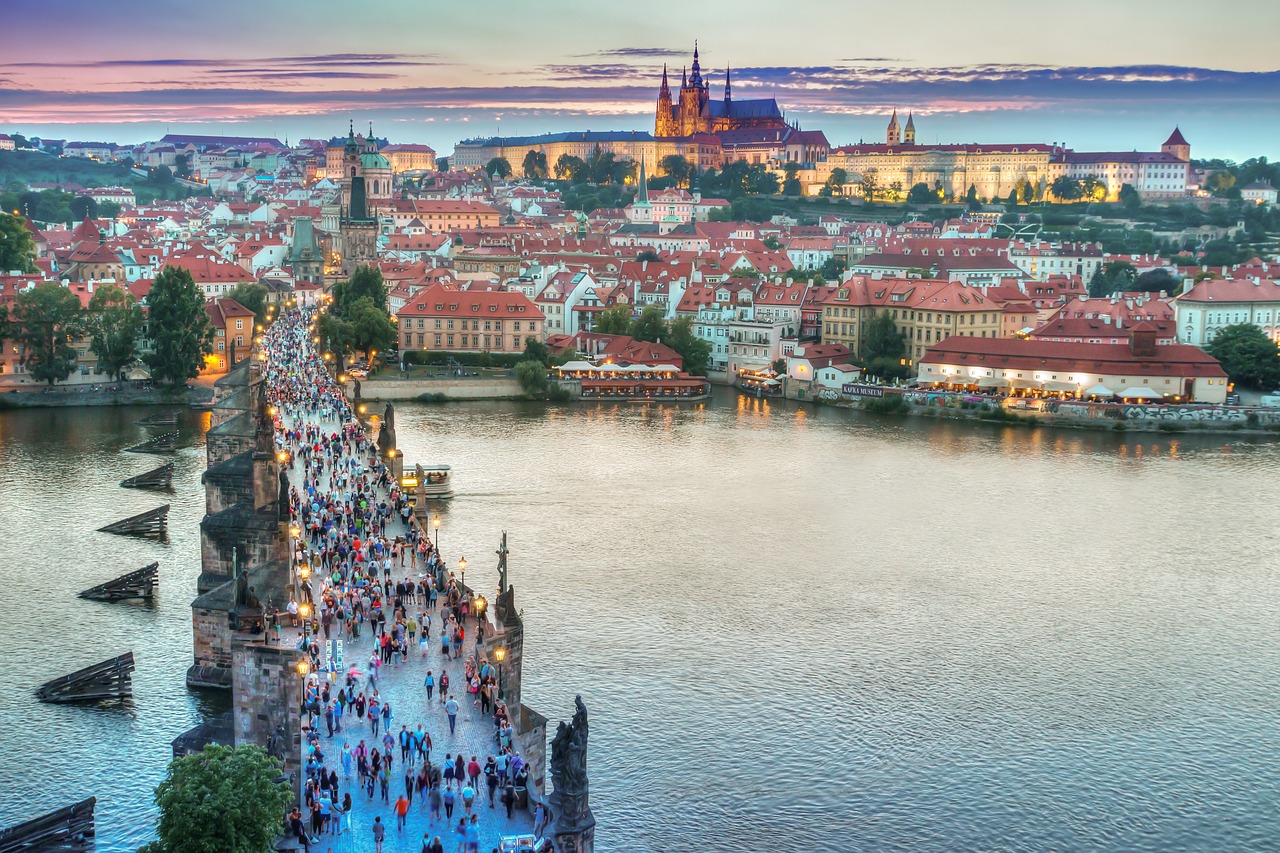 sunset from up high in prague of charles bridge